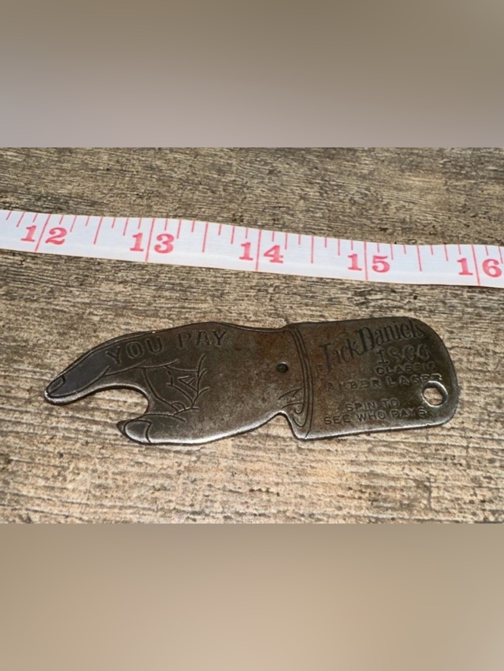 Vintage Jack Daniels Bottle opener, who pays spinner.